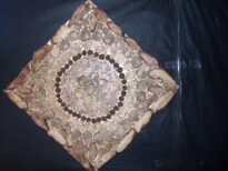 Mandala tamanho 72x72cm, composta de Vários tipos de cipós e com frutas Mutamba, uma fruta  do Cerrado Brasileiro. Valor R$280,00